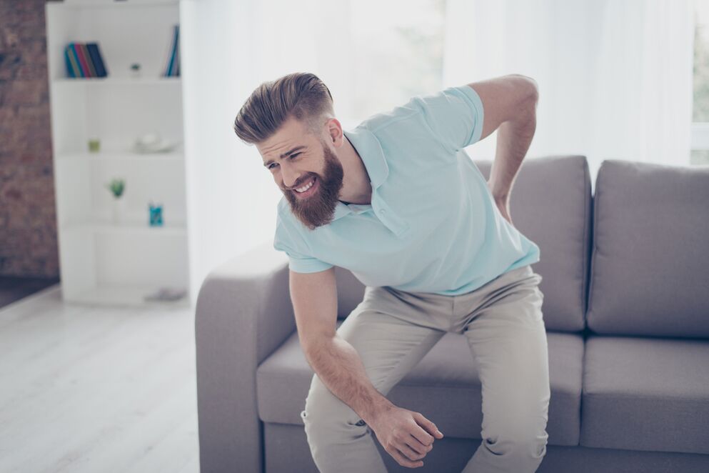 Acute lower back pain with acute movements in a patient with osteochondrosis